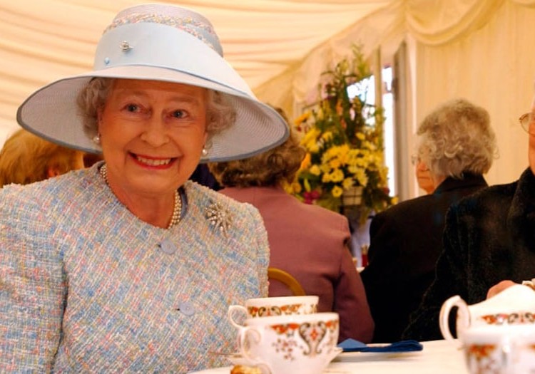 Our dutiful Queen enjoying a cup of tea