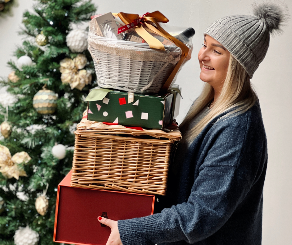 Woman Holding Low Cost Christmas Gifts