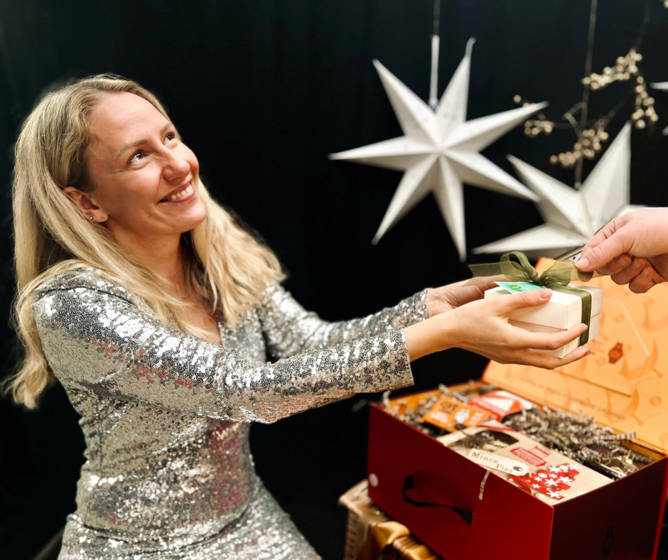 Woman Sharing Luxury Christmas Hamper 